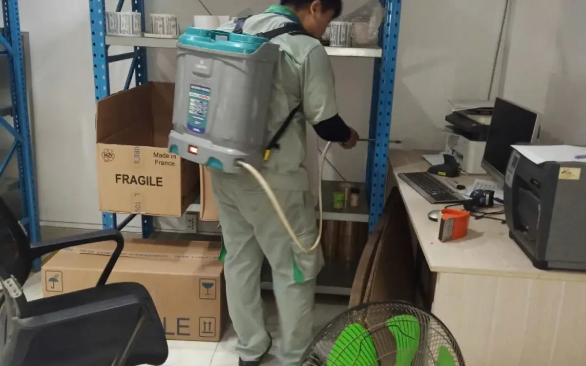 A technician treating an office materials store