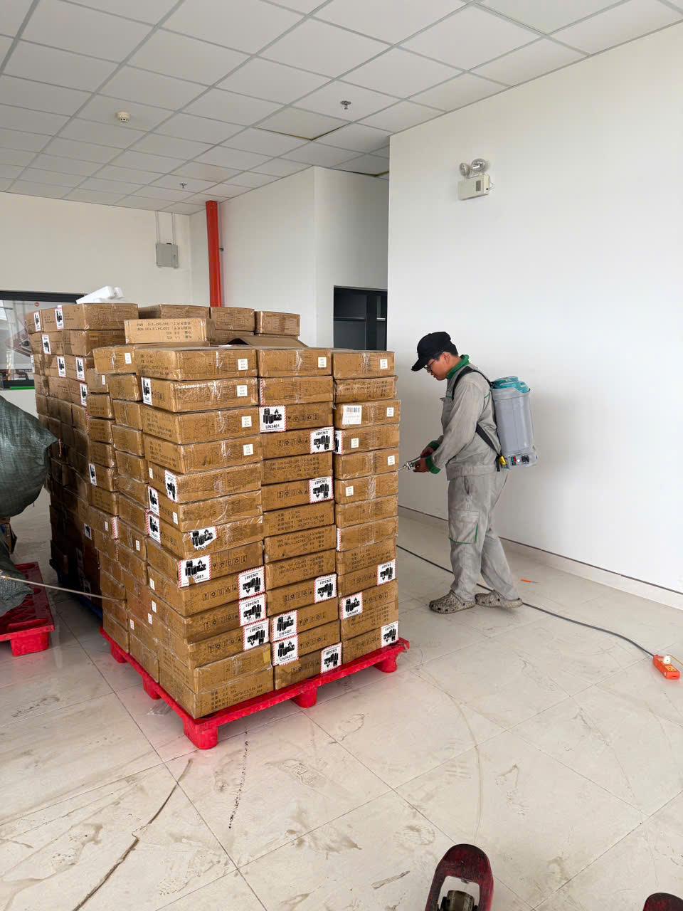 Treating a goods staging area before stock moves into the warehouse