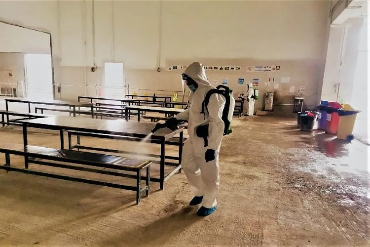 A Global Pest Control technician treating a canteen between service periods